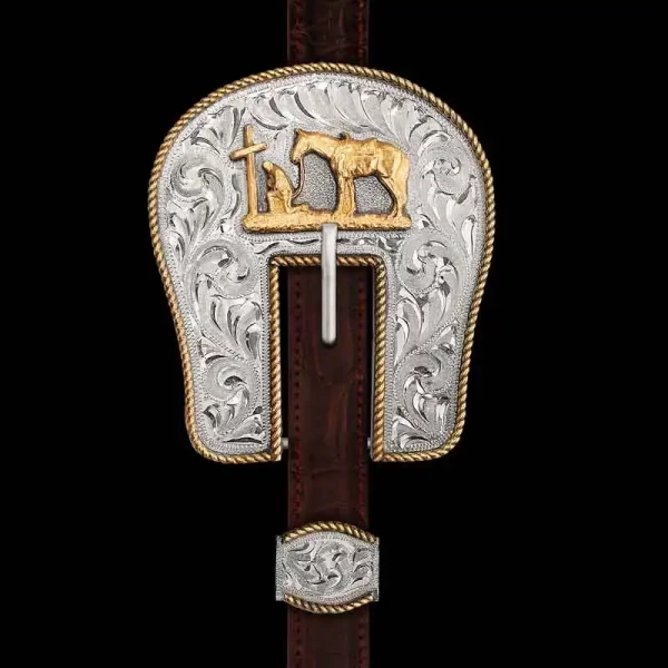 A traditional style Headstall Buckle, our Hanoverian Headstall Buckle is hand crafted on a German Silver base, showcasing hand-engraved scrollwork by our expert craftsmen that highlights the Jeweler's Bronze rope edge and figure. Customize your figure wit
